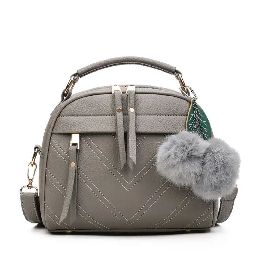 Shoulder Bag with Ball Fur